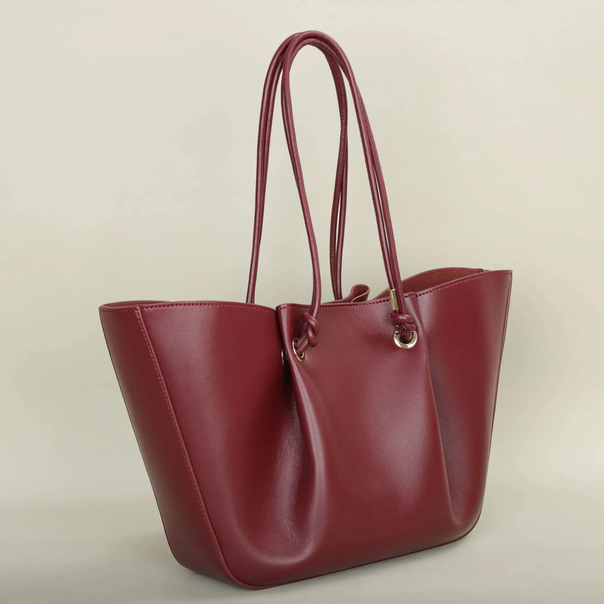 Genuine Leather Women’s Square Tote Bag with Sewing Thread Detail and Top Handle, Featuring Elegant Folds Design