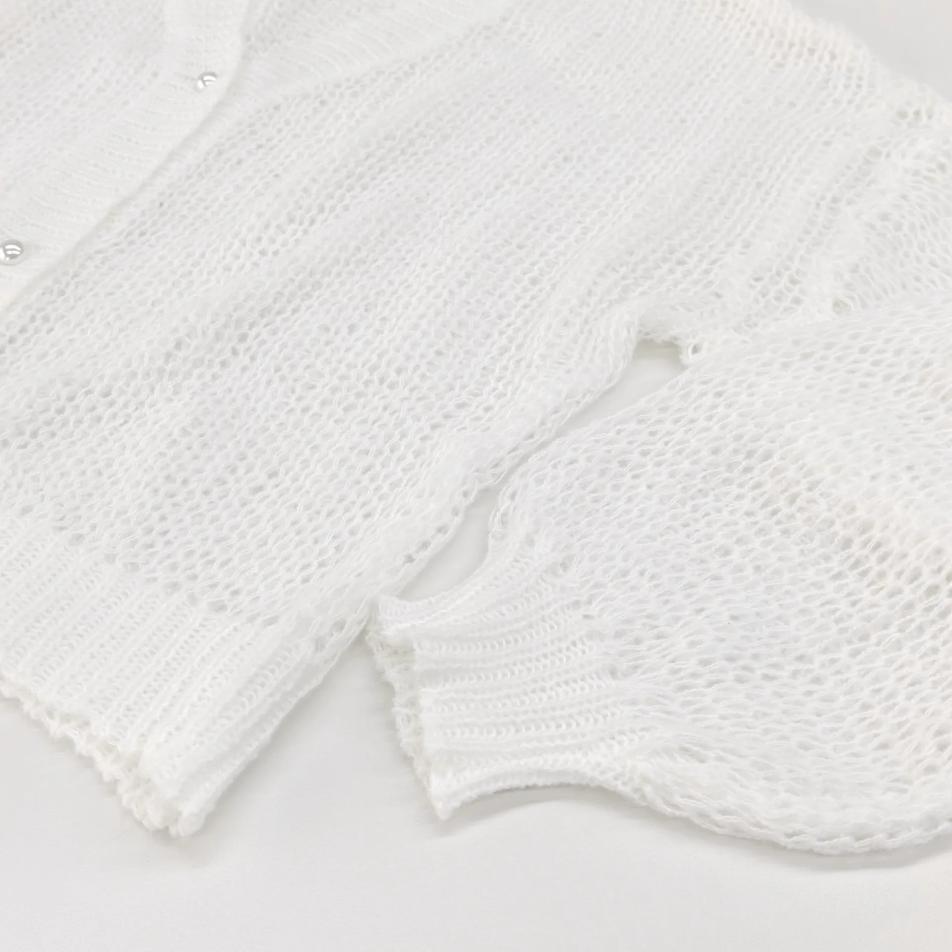 Solid Color Polyester Sweater with Long Sleeves, V Neck, and Single Breasted Closure in Streetwear Style